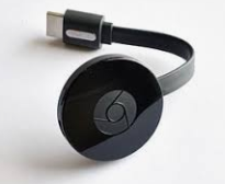 Image of a current generation Google Chromecast round puck